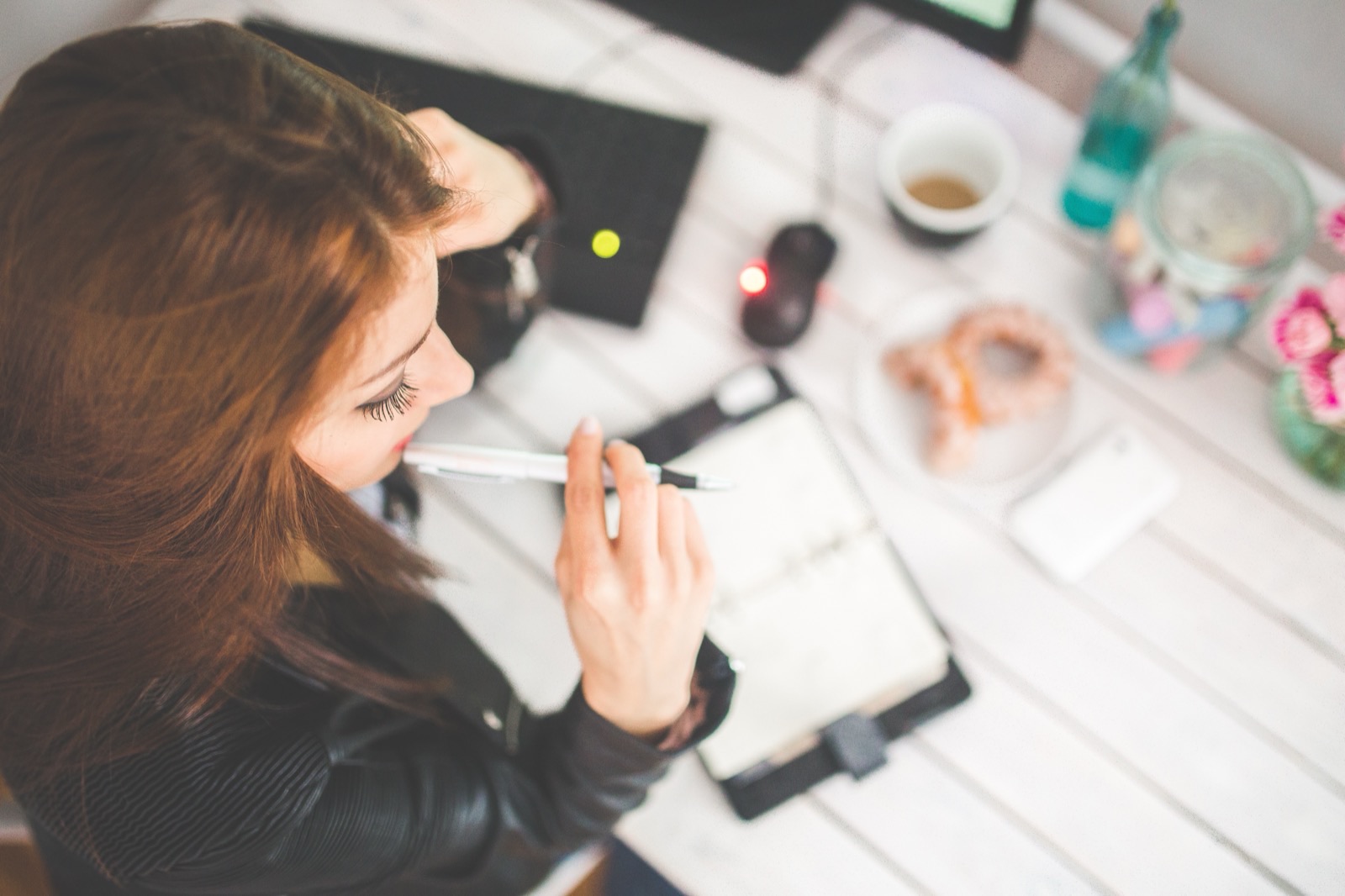 Creator planning an email campaign at a desk